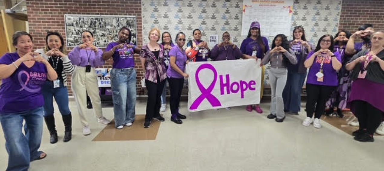 King Staff on Unity Day in their purple in honor of Domestic Violence Awareness.